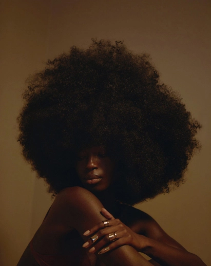 Portrait of a black woman with an afro